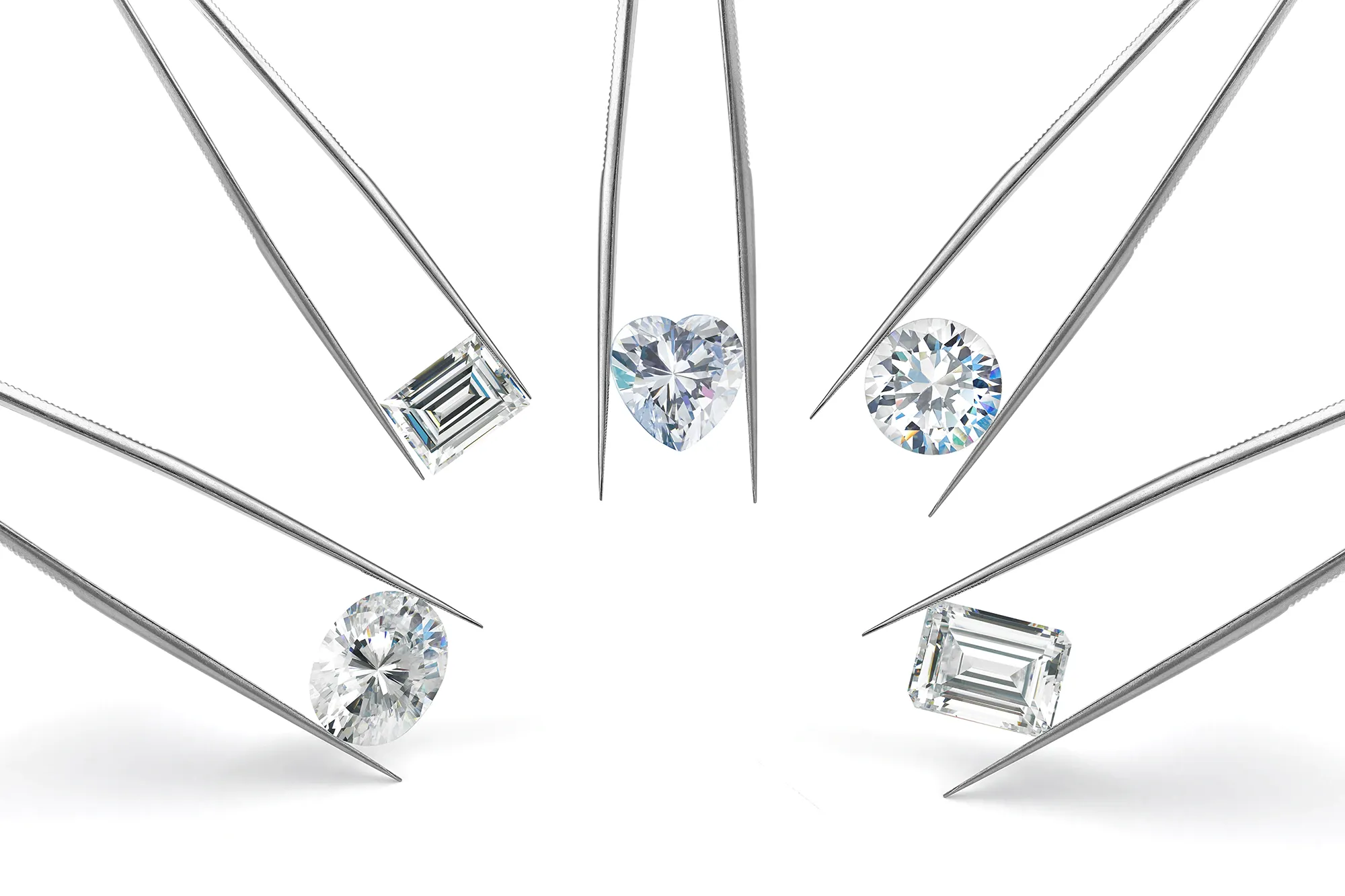 Five pairs of tweezers holding solitaire diamonds cut to different shapes.